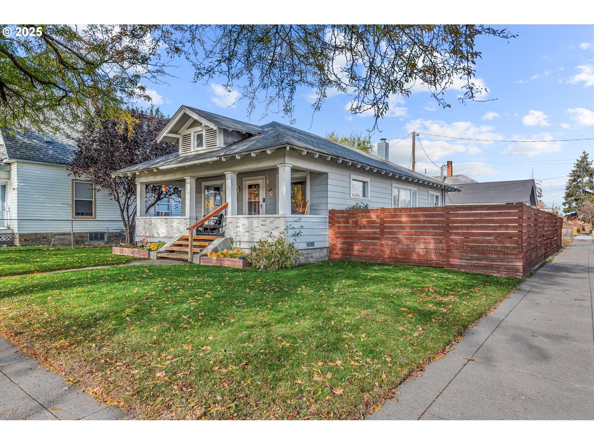 1410 Valley Avenue Baker City, OR 97814 - Photo 3 of 28 a front view of a house with garden