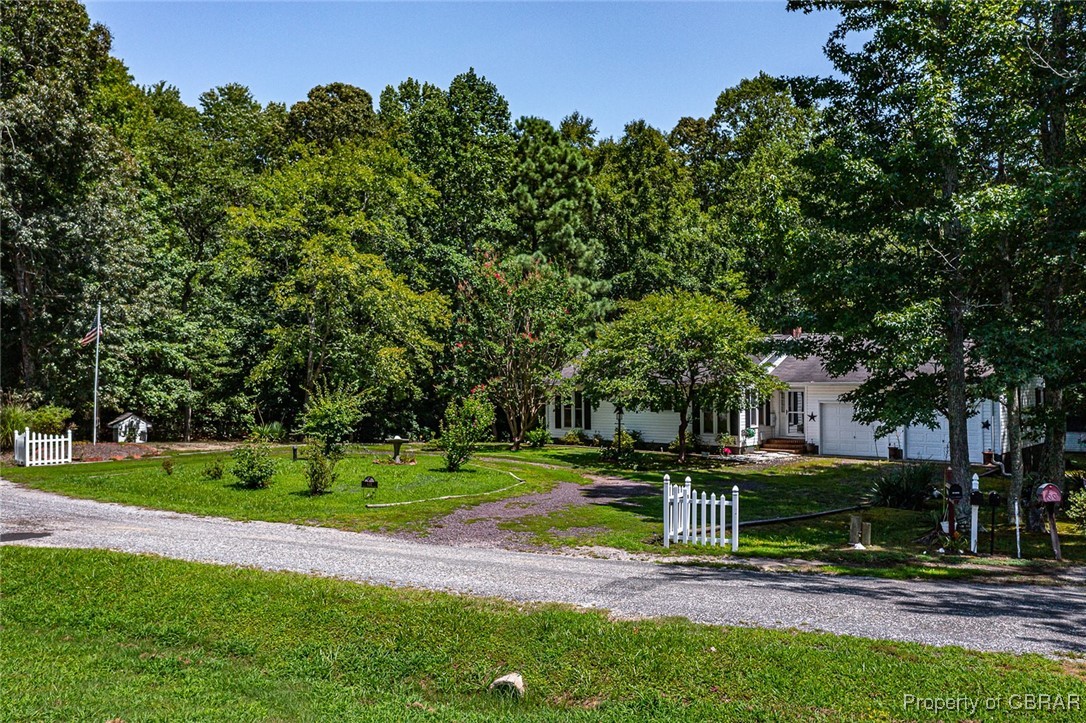 122 Old Glebe Point Road Burgess, VA 22432 - Photo 24 of 50 View of front of home featuring a front lawn