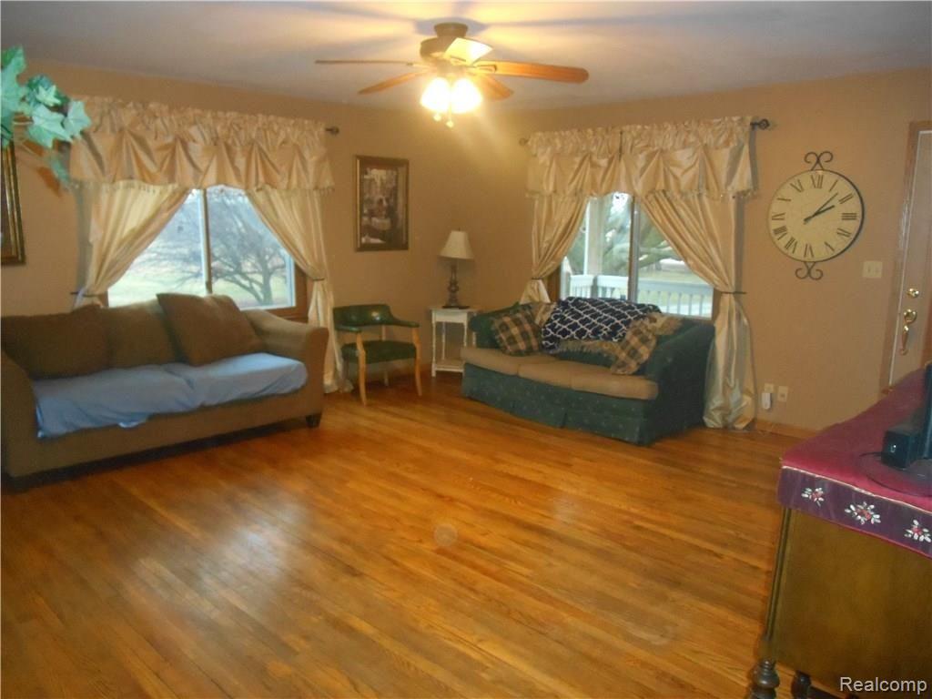 3701 Oak Grove Road North Branch, MI 48461 - Photo 13 of 45 Great Room. Large Picture Windows.