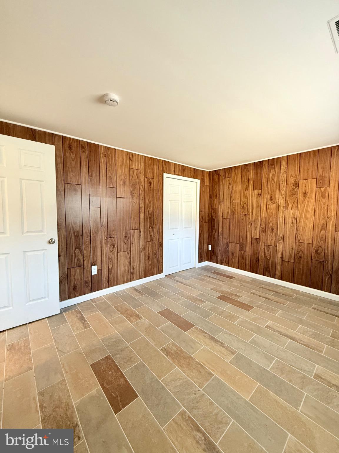 7250 Lasting Way Columbia, MD 21045 - Photo 21 of 39 Spacious lower level room with warm wood accents.