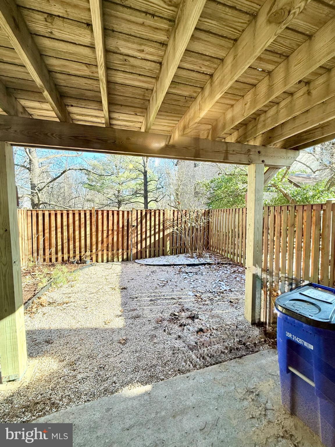 7250 Lasting Way Columbia, MD 21045 - Photo 32 of 39 Serene outdoor space with wooden beams.