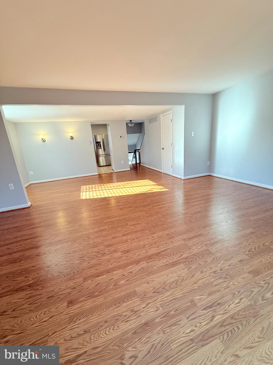 7250 Lasting Way Columbia, MD 21045 - Photo 8 of 39 Spacious, sunlit open living area.