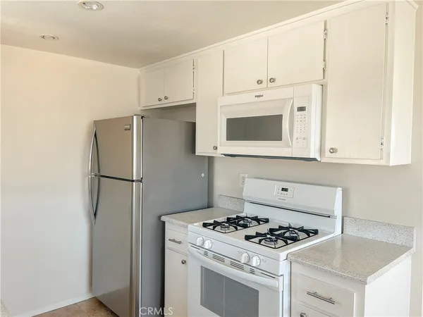 a view of hallway with closet