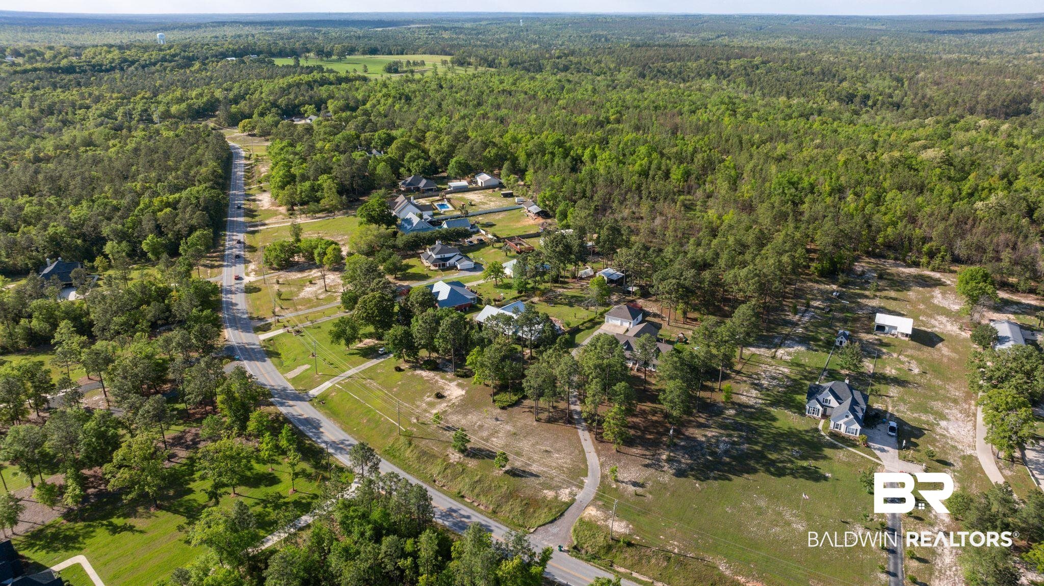 3100 Radcliff Road Saraland, AL 36571 - Photo 58 of 65 Bird's eye view with a wooded view