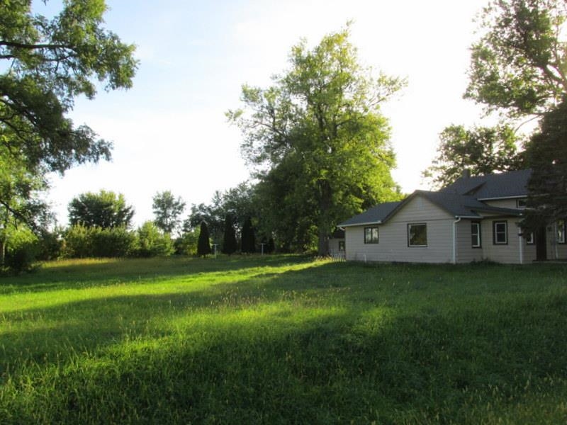 15917 West Harper Road Forreston, IL 61030 - Photo 38 of 38 a front view of a house with a yard