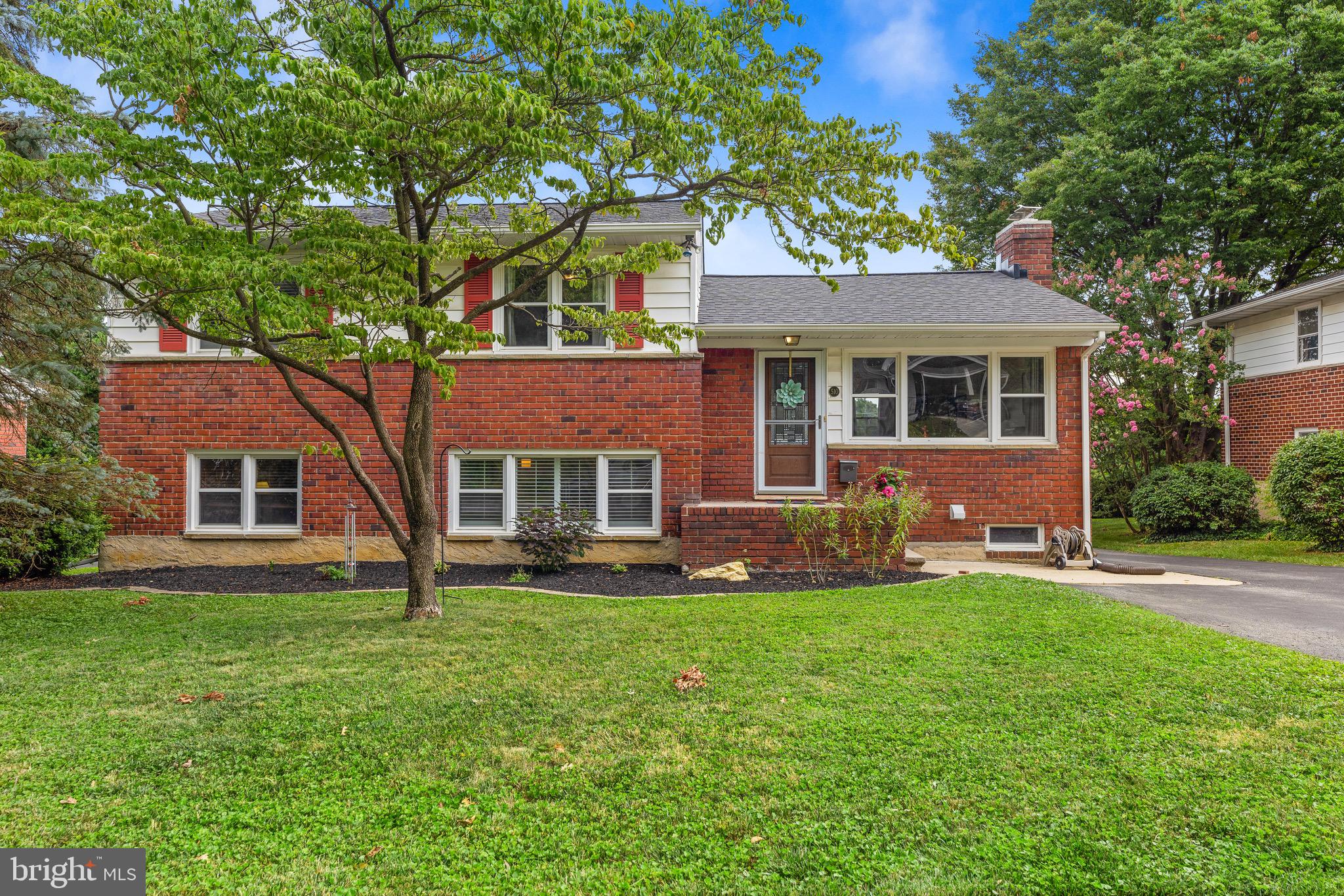 510 Epsom Road Towson, MD 21286 - Photo 2 of 48 Maintained lawn and paver lined flower bed