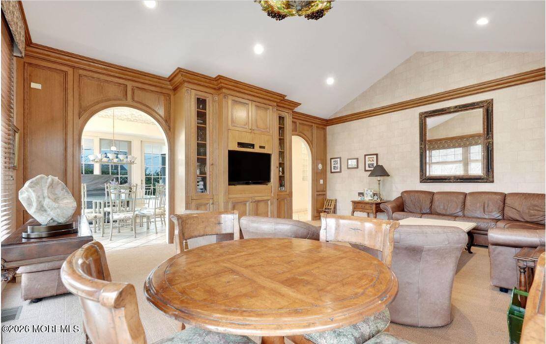 57 Darlington Road Deal, NJ 07723 - Photo 19 of 27 a living room with furniture and a flat screen tv