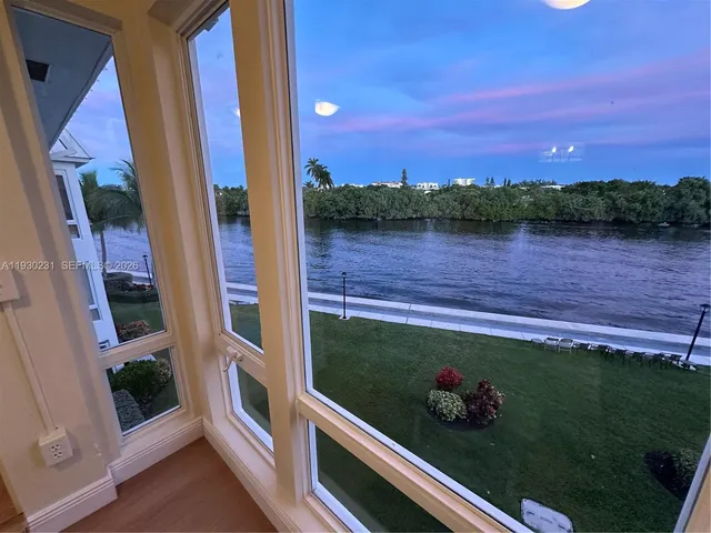 a view of a lake from a balcony