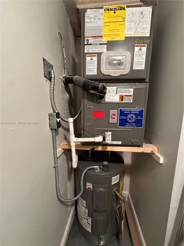 a view of a hallway with wooden floor and stairs