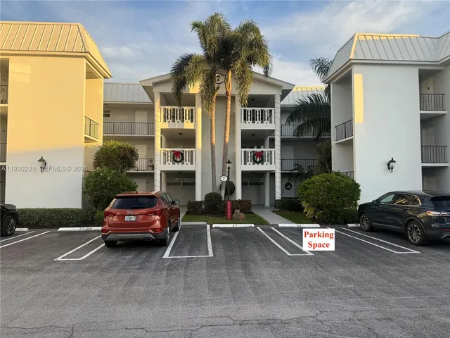 a car parked in front of a house