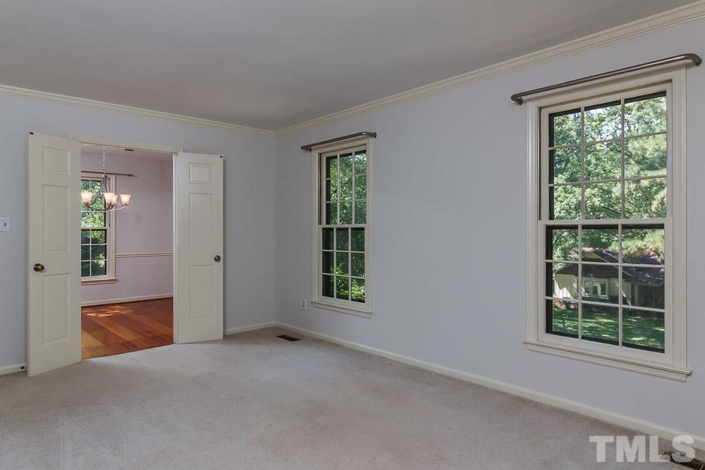 3313 Boulder Court Raleigh, NC 27607 - Photo 22 of 24 an empty room with windows