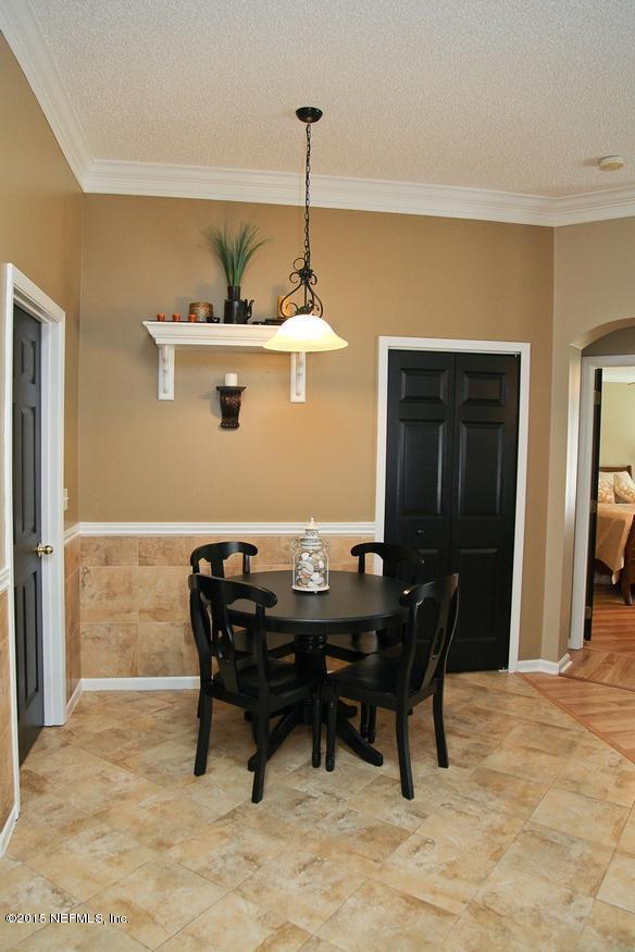 4308 Rye Court St. Johns, FL 32259 - Photo 11 of 18 a view of a dining room with furniture