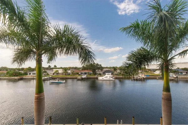 a view of swimming pool with outdoor seating