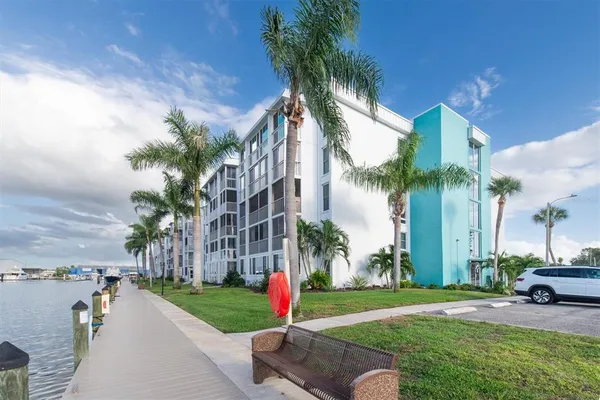a view of a park with a slide and table of the house