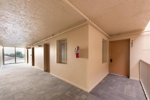 a view of hallway with livingroom