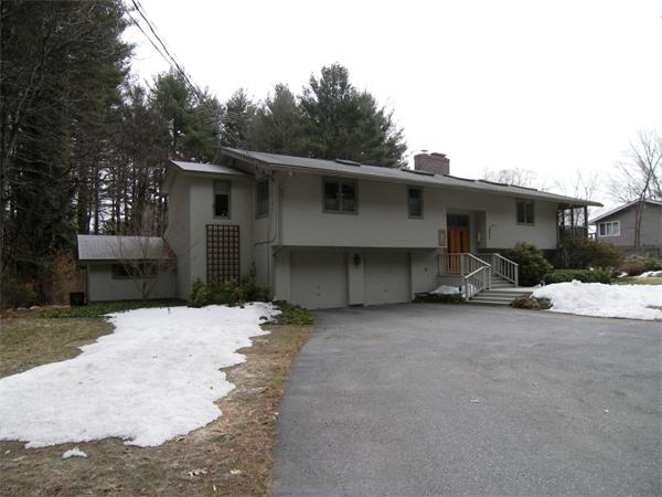 35 Garner Road Stow, MA 01775 - Photo 16 of 16 a front view of a house with trees