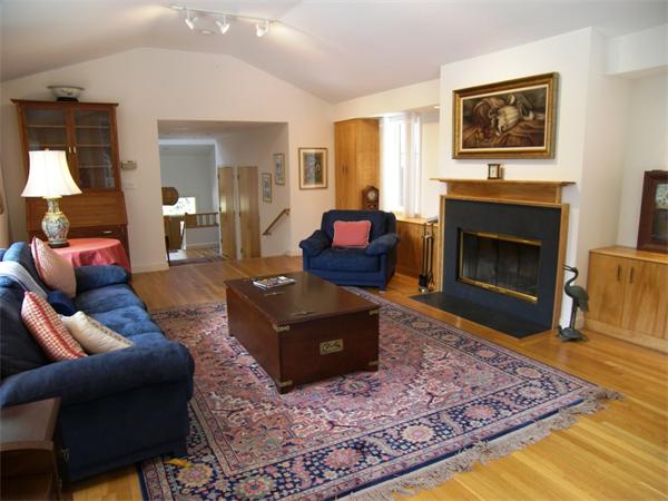 35 Garner Road Stow, MA 01775 - Photo 3 of 16 a living room with furniture and a fireplace