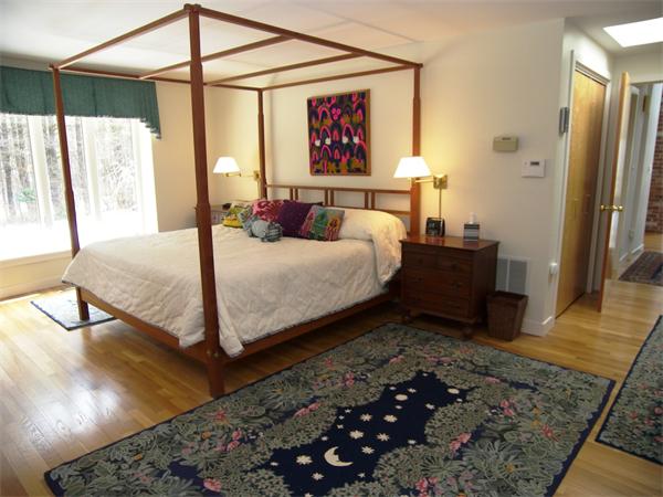35 Garner Road Stow, MA 01775 - Photo 7 of 16 a bedroom with a bed window and a table