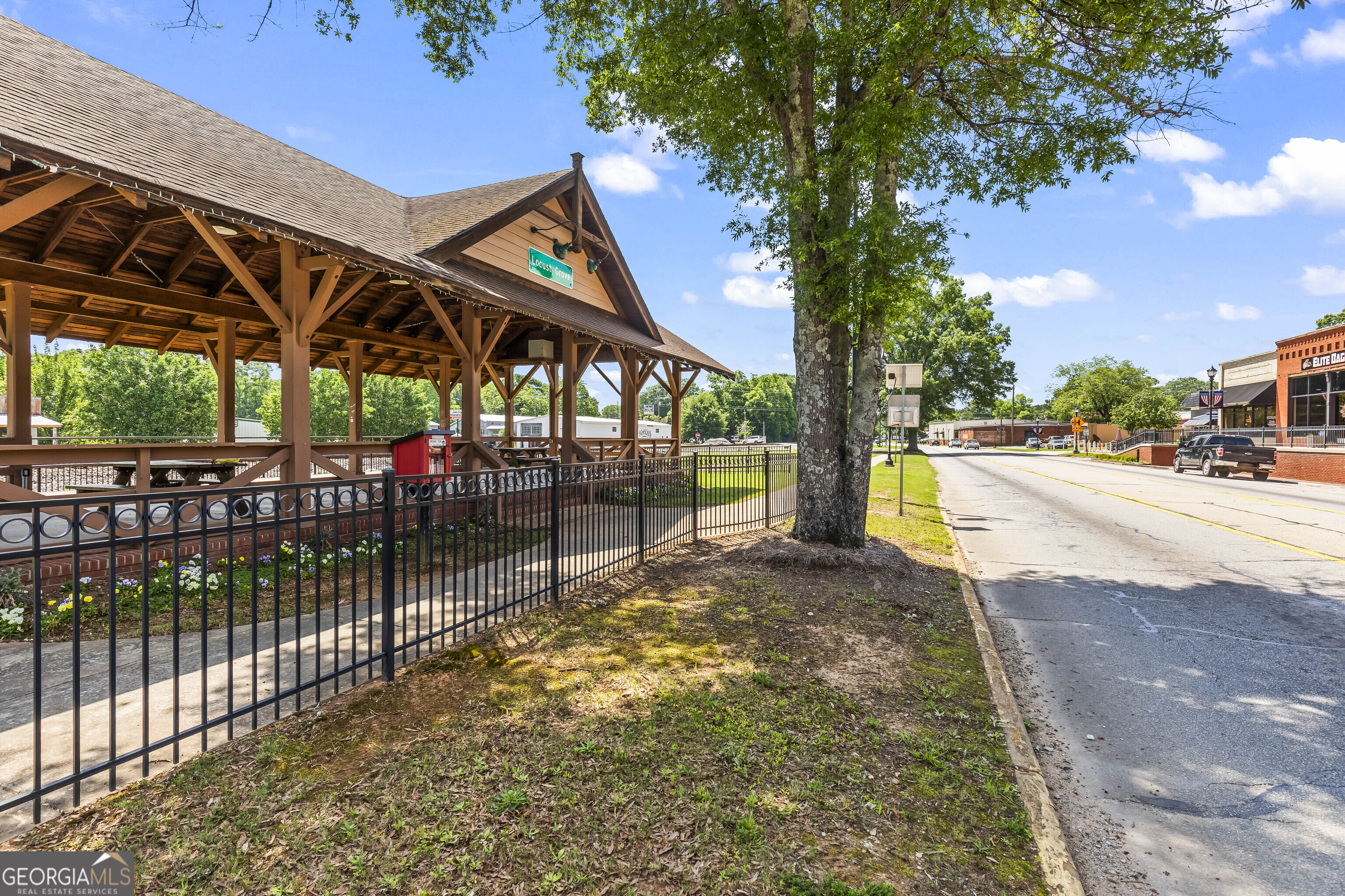 355 Chuli Road Griffin, GA 30223 - Photo 11 of 16 a view of a backyard with a large tree
