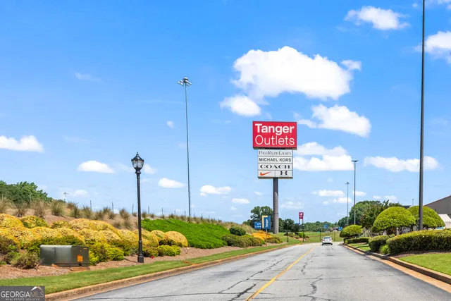 a view of street with sitting area