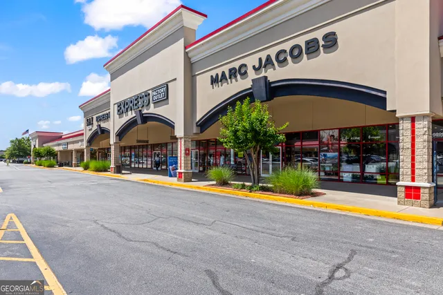 a view of street with shops