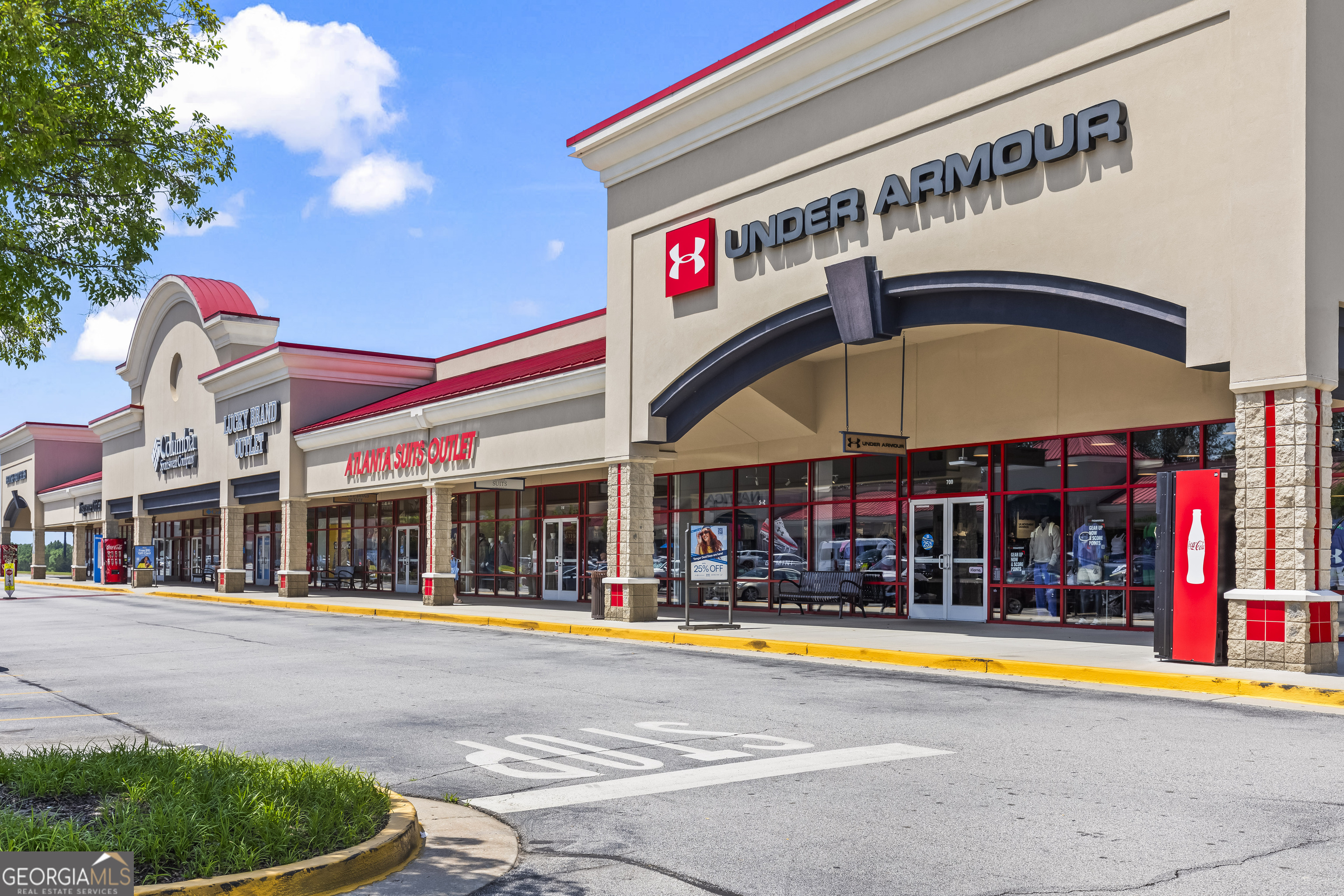 355 Chuli Road Griffin, GA 30223 - Photo 16 of 16 a view of street with shops