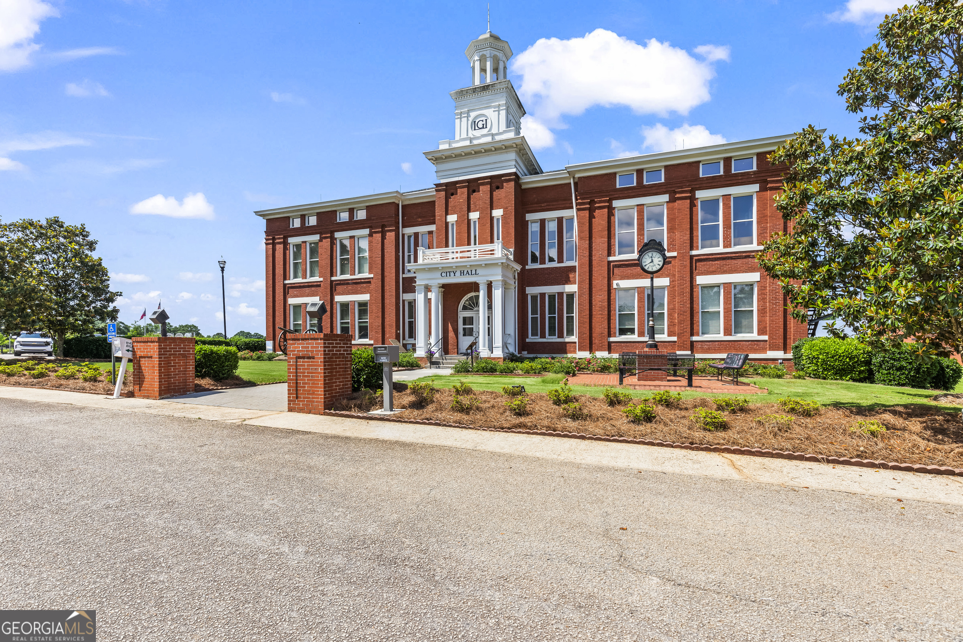 355 Chuli Road Griffin, GA 30223 - Photo 9 of 16 front view of a house with a garden