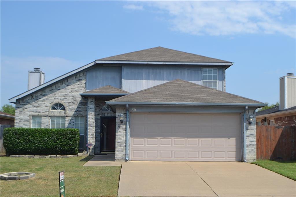 731 Valley Spring Drive Arlington, TX 76018 - Photo 1 of 1 a front view of a house with garden