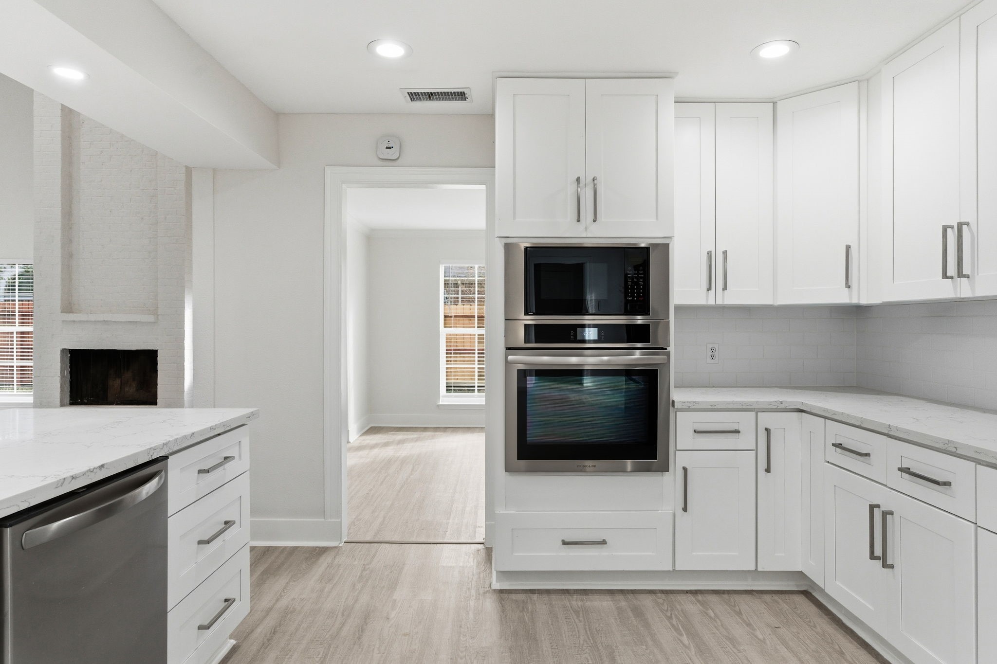 13811 Menasco Court Houston, TX 77077 - Photo 16 of 50 All appliances were bought with the remodel and have never been used. There is a built-in Frigidaire microwave and electric single oven in the kitchen.