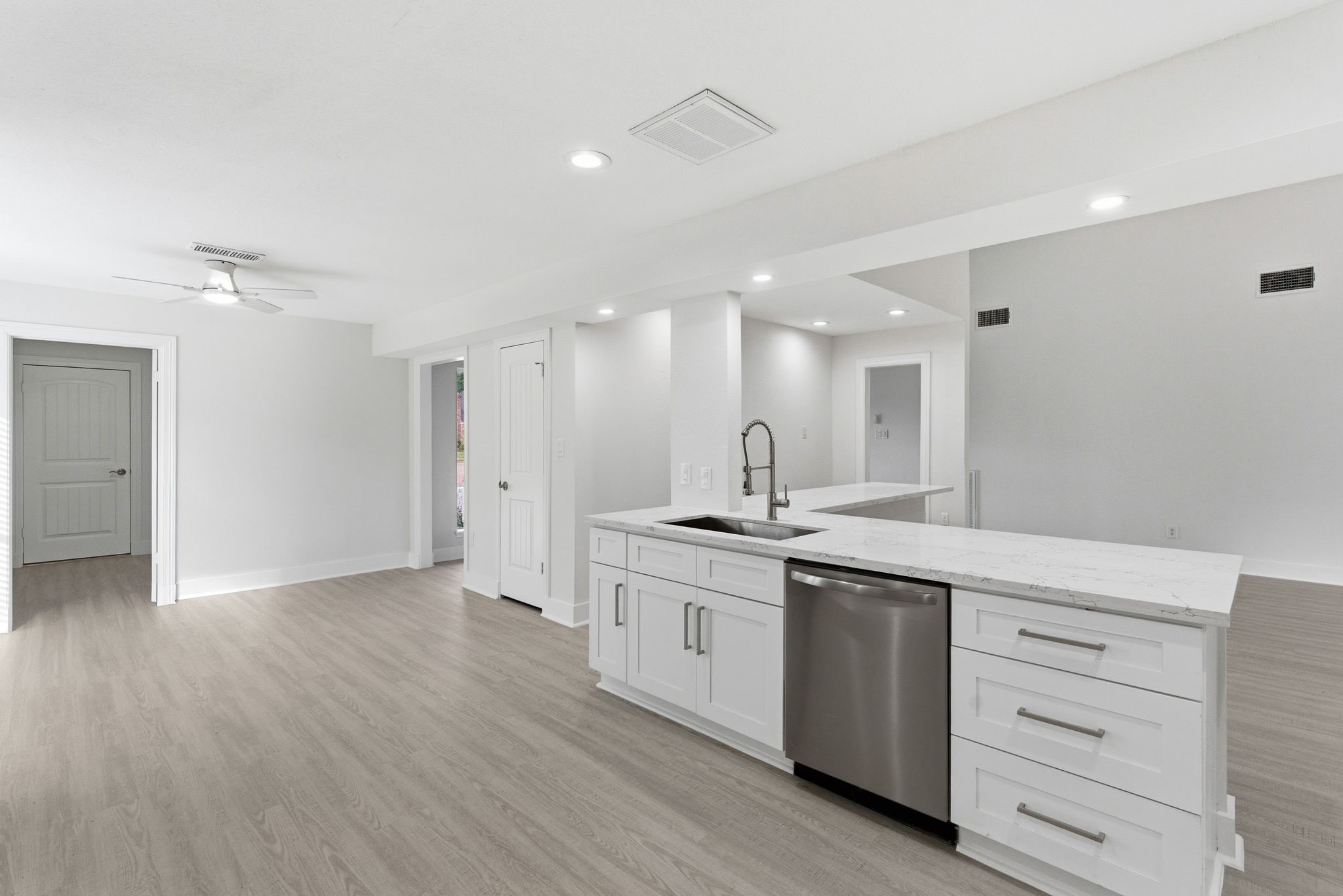13811 Menasco Court Houston, TX 77077 - Photo 19 of 50 There is a deep basin sink with recent garbage disposal and a Frigidaire dishwasher in the island.