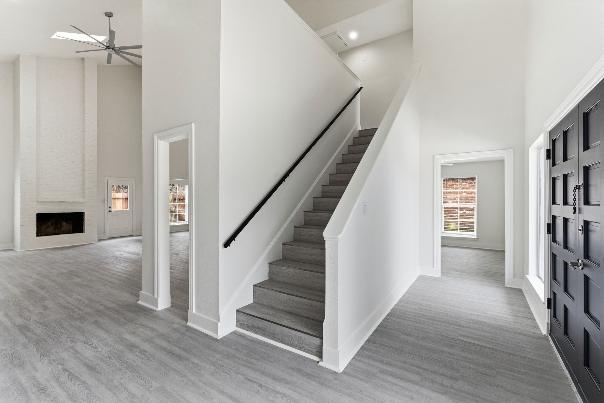 13811 Menasco Court Houston, TX 77077 - Photo 3 of 50 As soon as you walk through the front door you are greeted by luxury vinyl plank floors that flow throughout the living spaces and bedrooms.