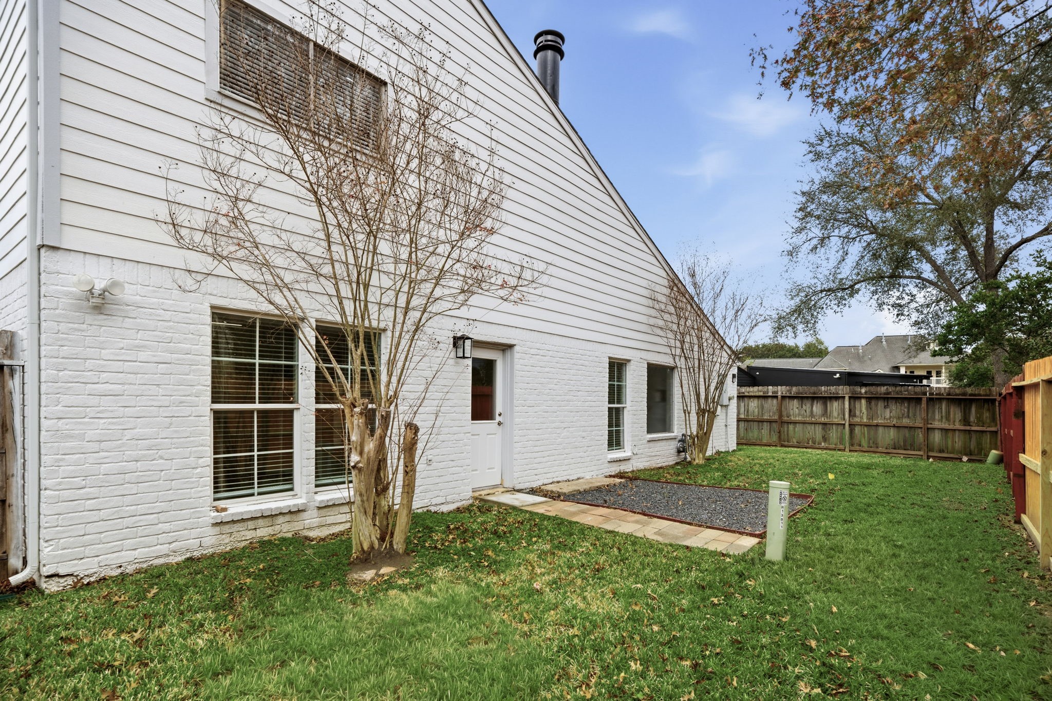 13811 Menasco Court Houston, TX 77077 - Photo 40 of 50 There is plenty of green space out back for kids and animals to play!
