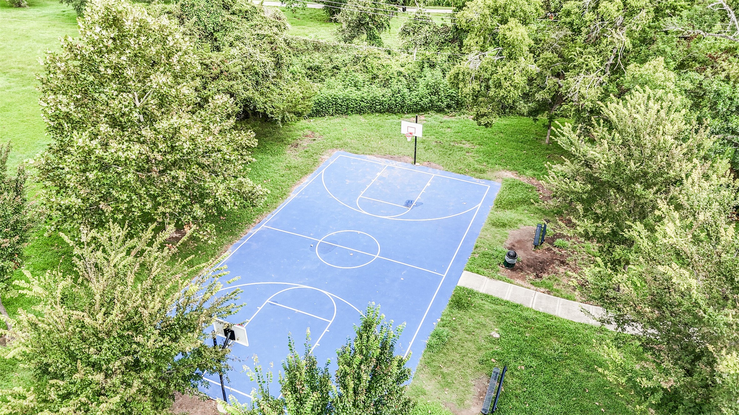 13811 Menasco Court Houston, TX 77077 - Photo 47 of 50 The basketball court was recently repaved and you can join a pick up game with other neighbors.