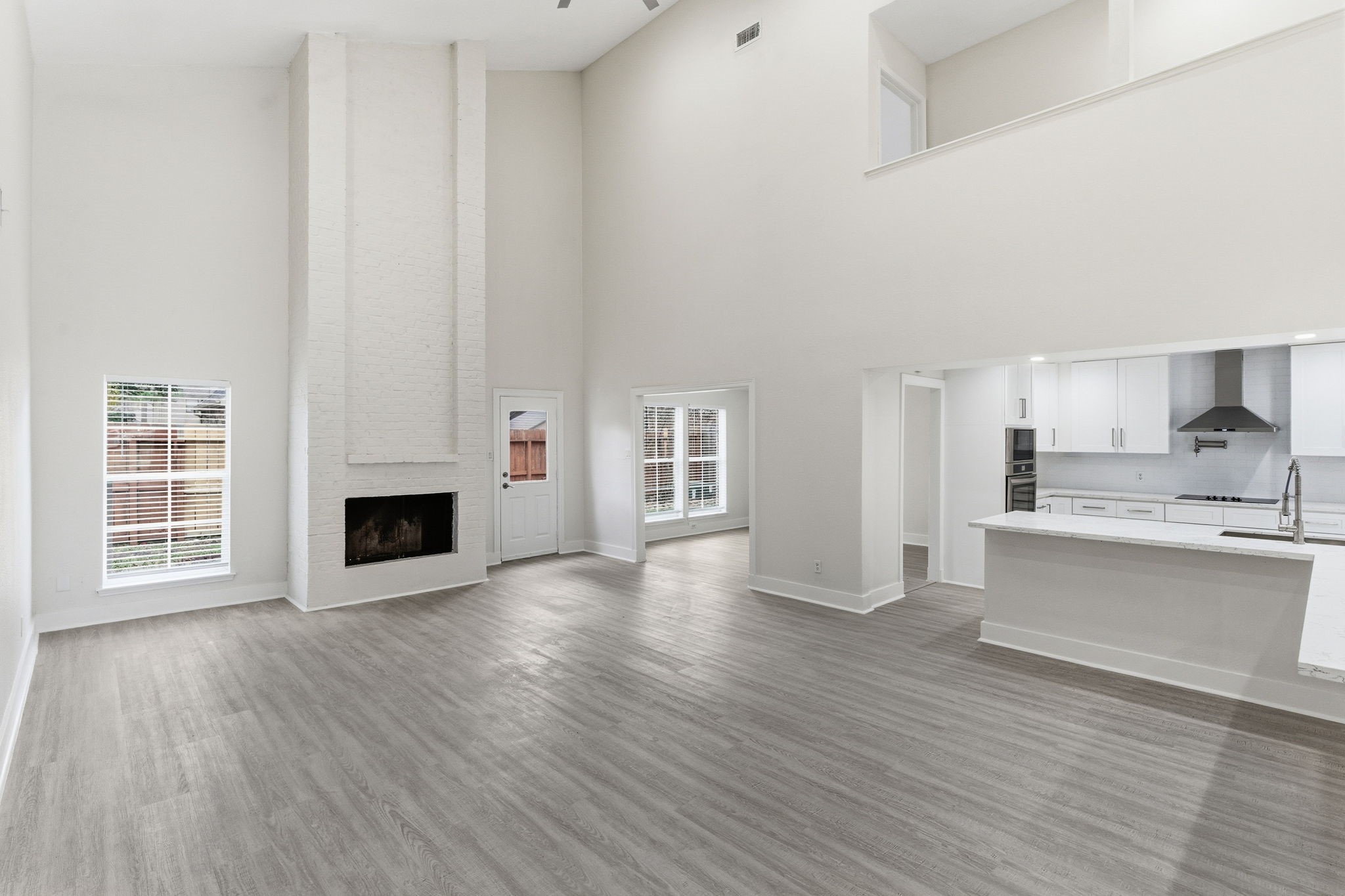 13811 Menasco Court Houston, TX 77077 - Photo 7 of 50 From this angle of the family room your can see the kitchen is open to the family room.