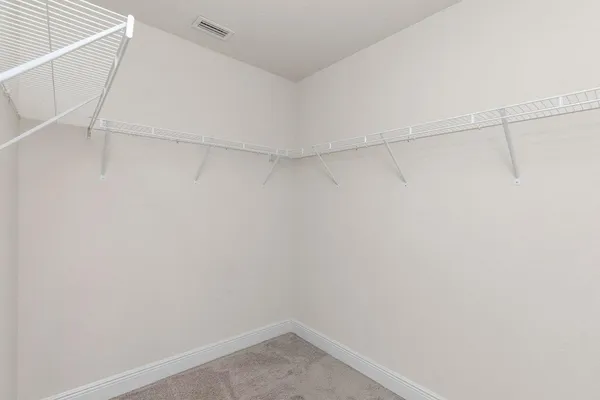 a view of a room with racks on the wall