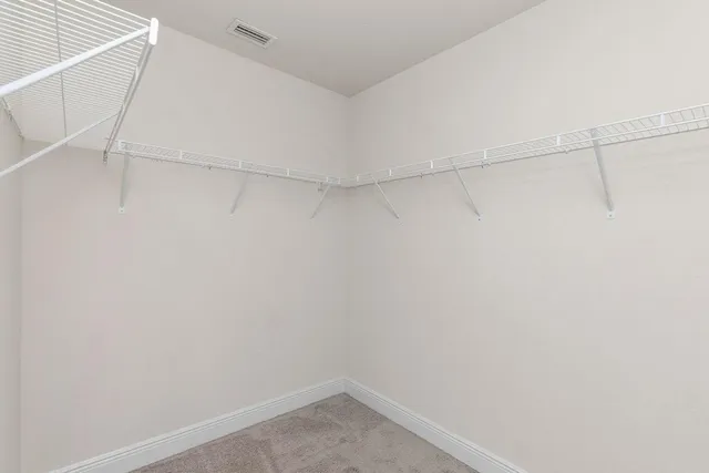 a view of a room with racks on the wall