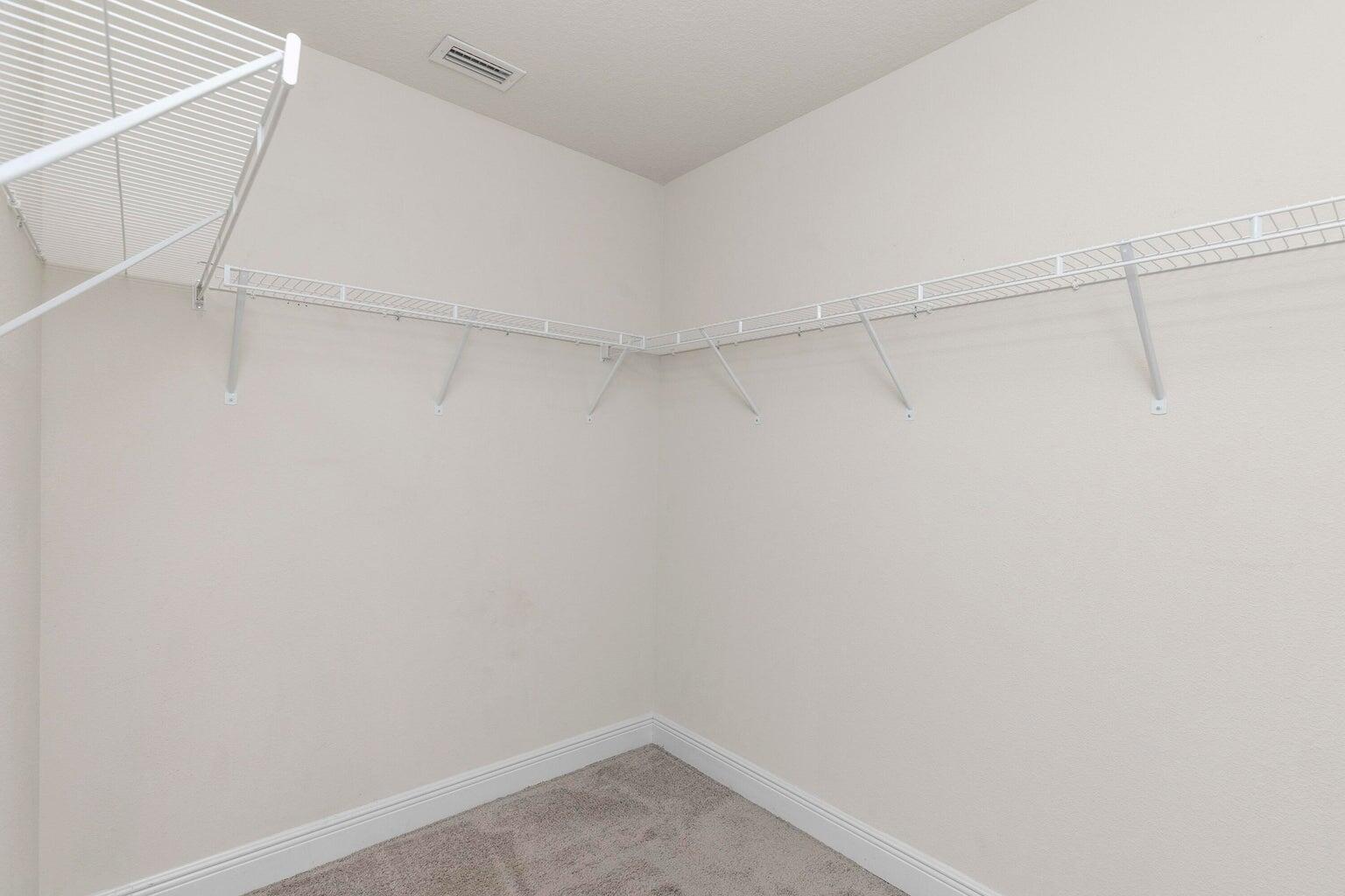 2365 Genevieve Way Crestview, FL 32536 - Photo 24 of 33 a view of a room with racks on the wall