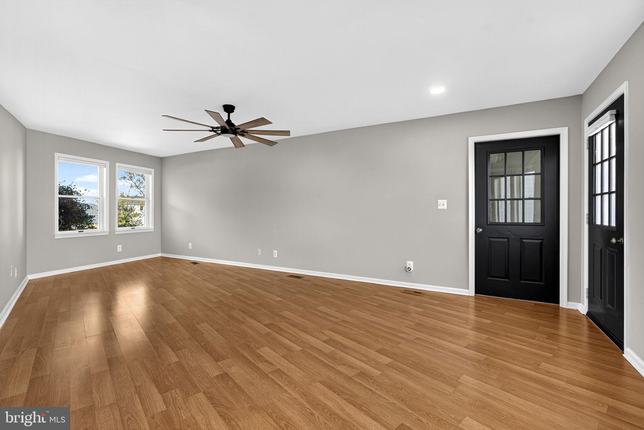 2140 6th Street Middletown, VA 22645 - Photo 20 of 62 a view of a livingroom with a ceiling fan and window