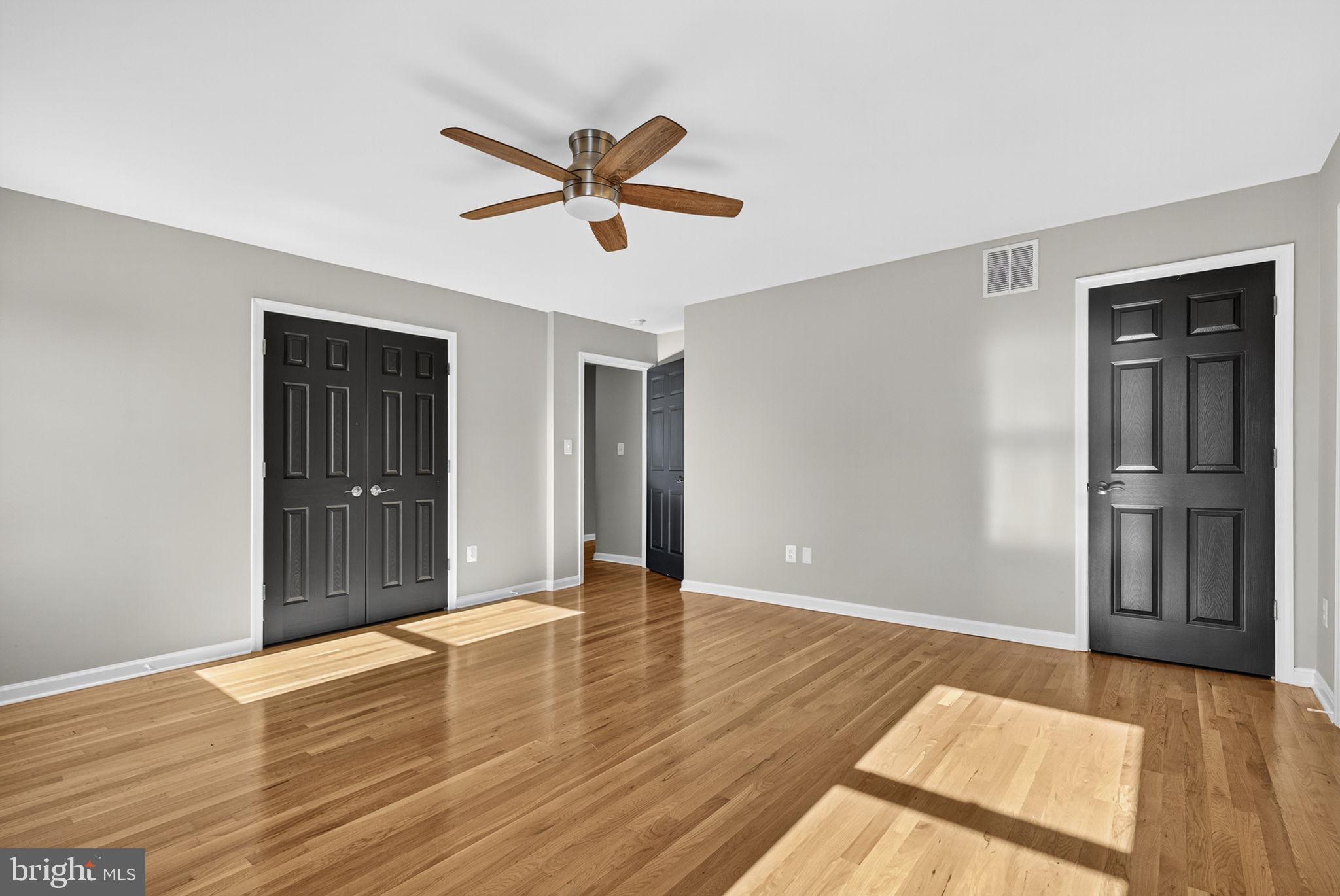 2140 6th Street Middletown, VA 22645 - Photo 26 of 62 a view of empty room with wooden floor
