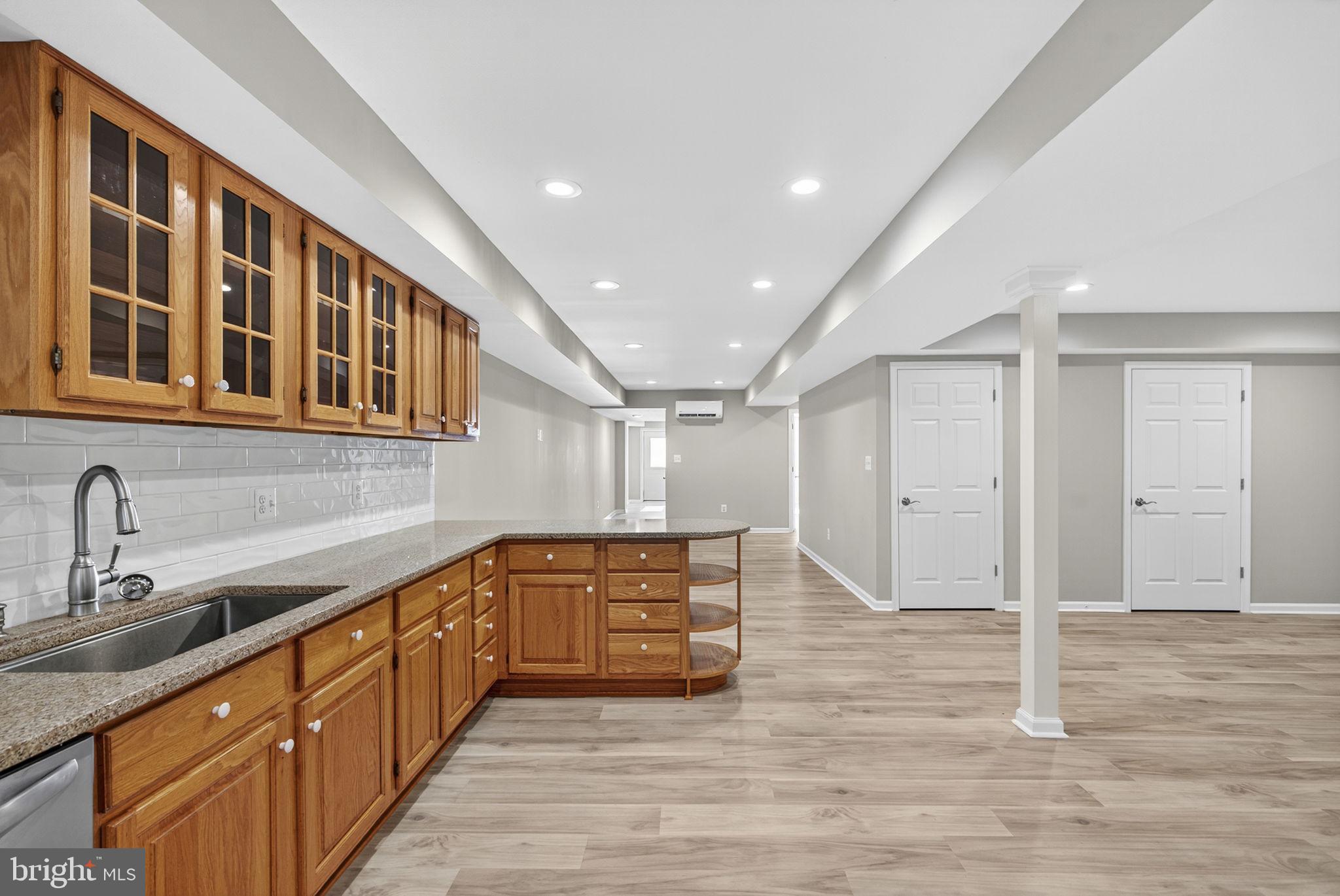 2140 6th Street Middletown, VA 22645 - Photo 45 of 62 a large kitchen with stainless steel appliances granite countertop a sink and cabinets