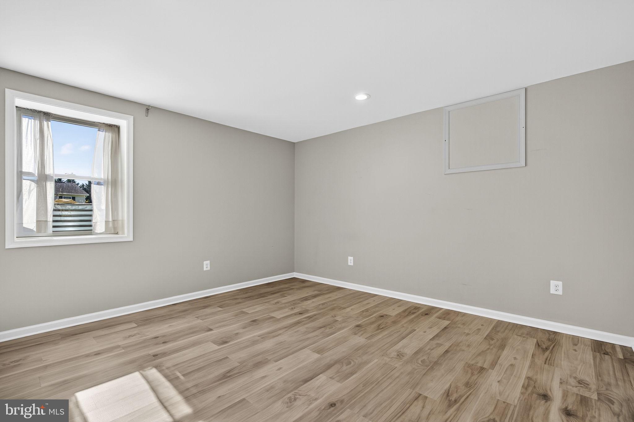 2140 6th Street Middletown, VA 22645 - Photo 50 of 62 a view of empty room with wooden floor
