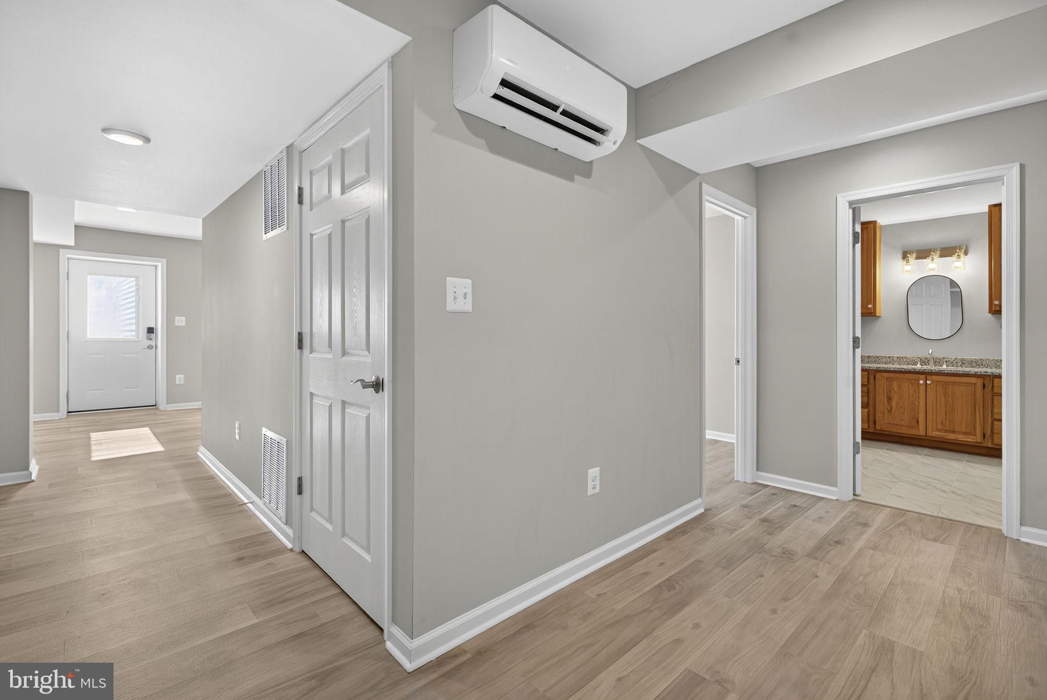 2140 6th Street Middletown, VA 22645 - Photo 57 of 62 a view of a hallway with wooden floor