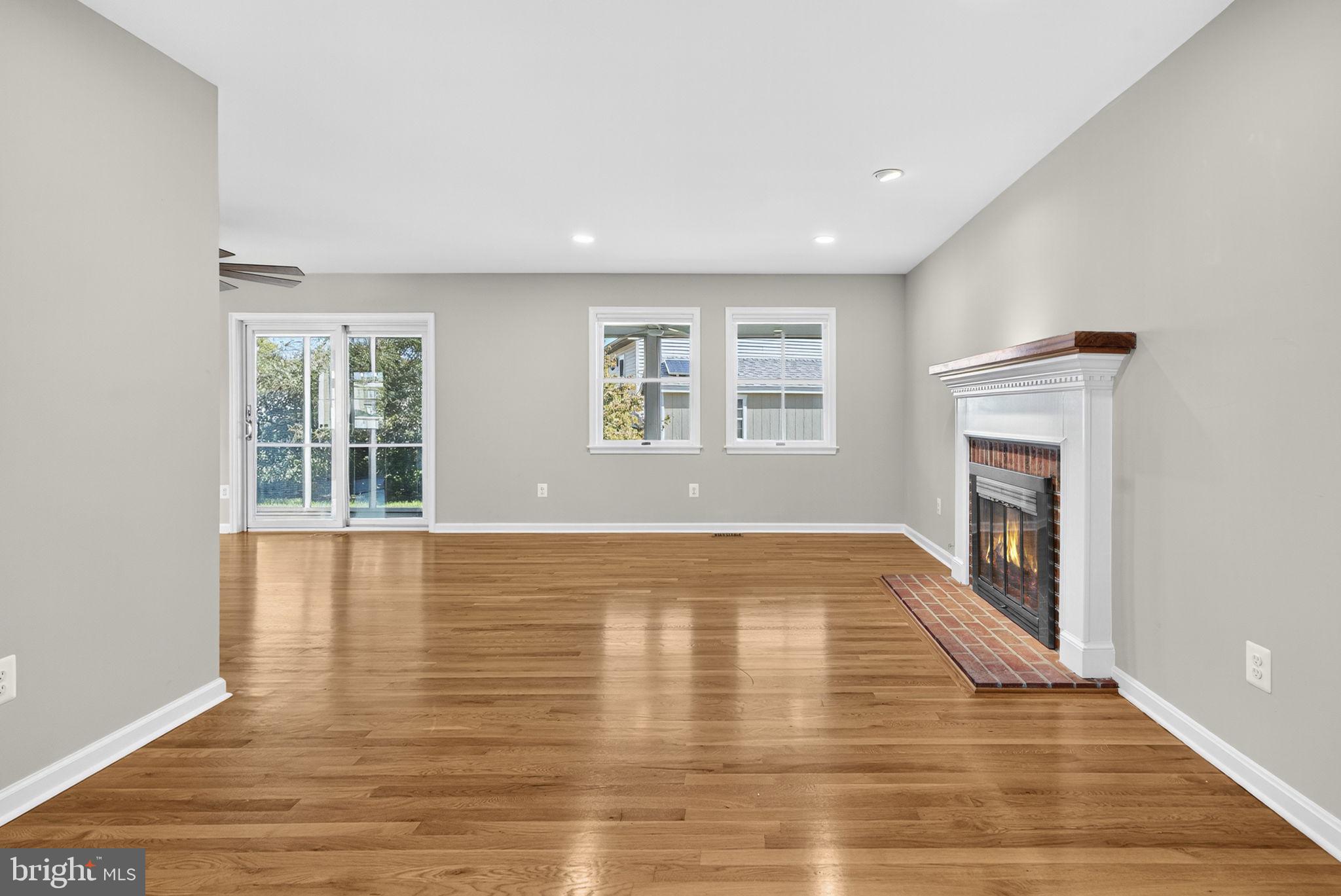 2140 6th Street Middletown, VA 22645 - Photo 6 of 62 a view of an empty room with wooden floor and a window