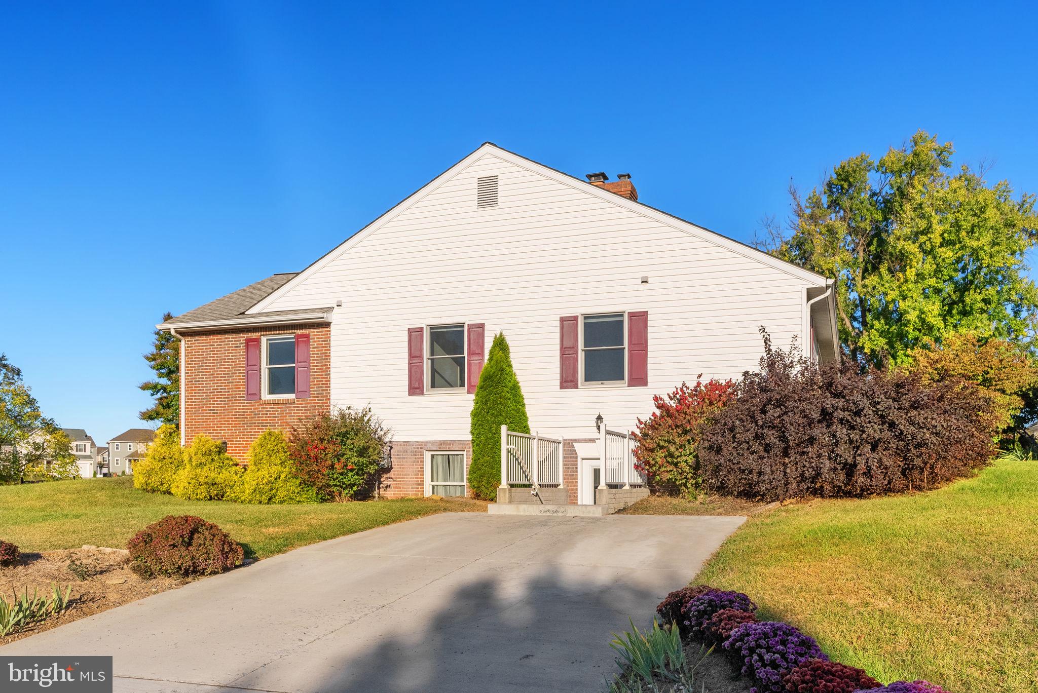 2140 6th Street Middletown, VA 22645 - Photo 61 of 62 a view of a house with backyard and garden