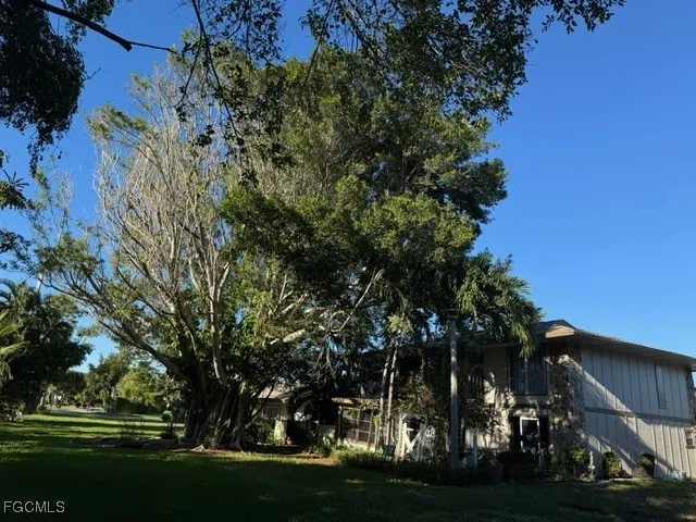 a view of outdoor space and yard