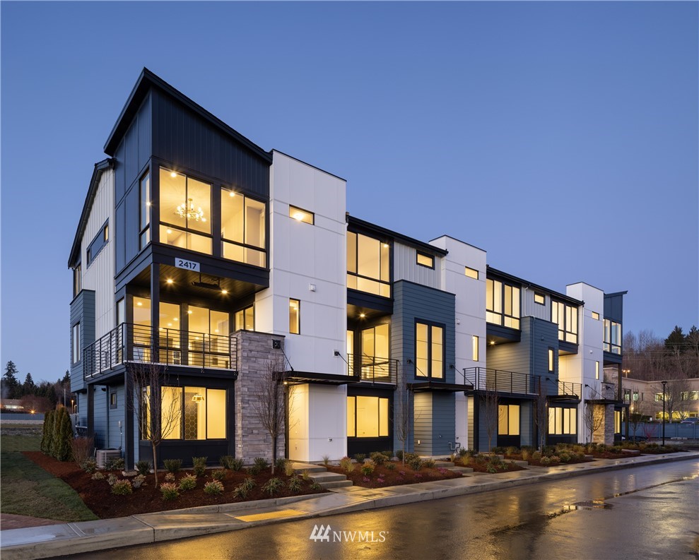 110 219th Place Southeast, Unit C Bothell, WA 98021 - Photo 1 of 7 a front view of building with lake view and windows