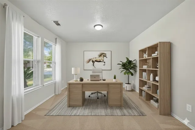 a dining room with furniture and window