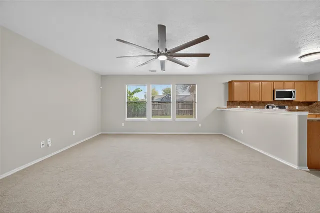 a view of a livingroom with a flat screen tv