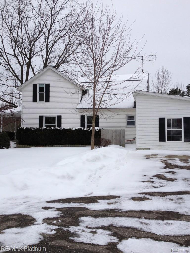 5125 North Burkhart Road Howell, MI 48855 - Photo 2 of 24 Side view