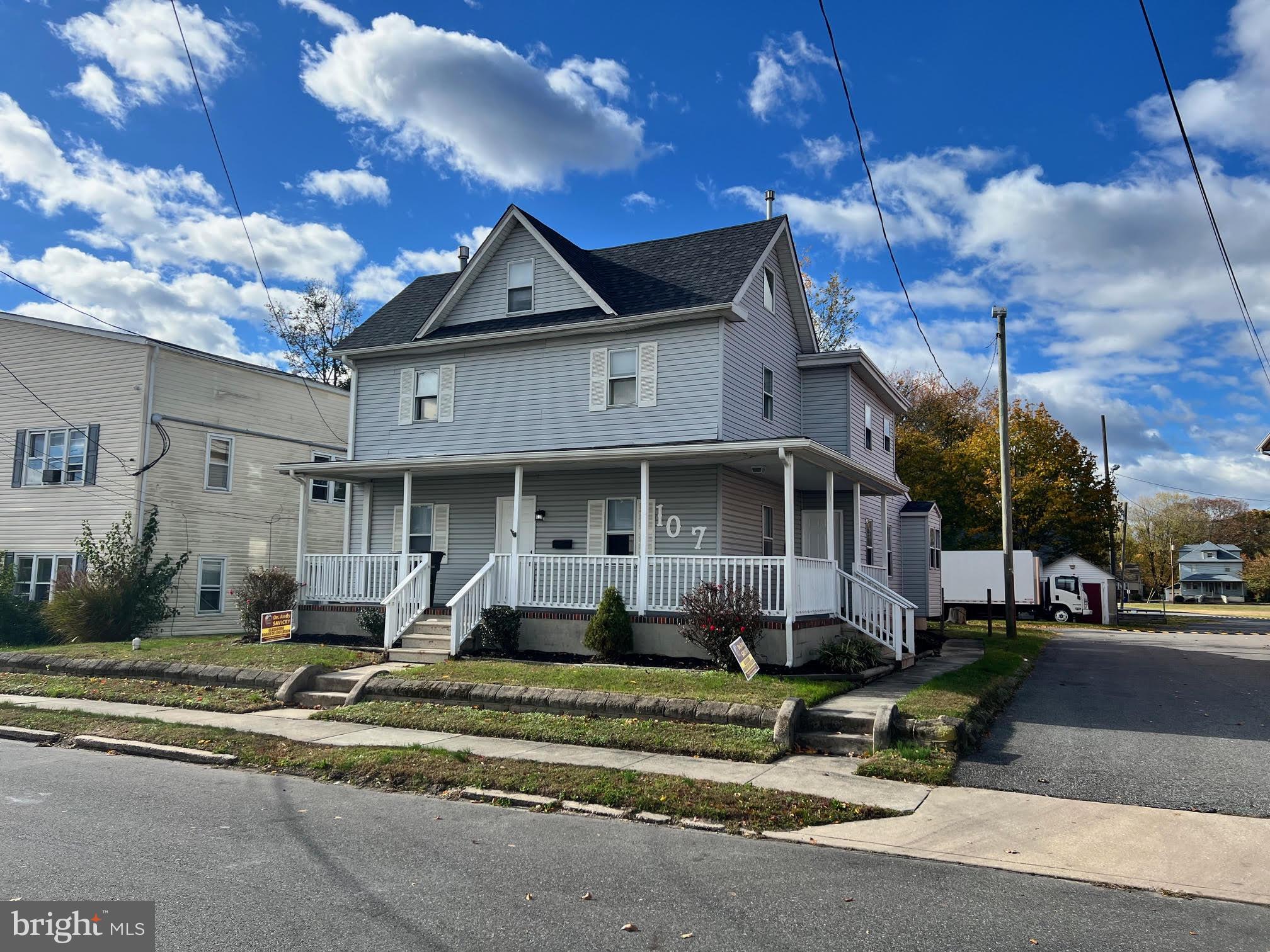 107 Church Street, Unit B Glassboro, NJ 08028 - Photo 2 of 9 a front view of a house with a yard